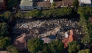 This aerial view shows a collapsed building after an earthquake in Cali, Colombia on August 10, 2026. Photo by JOAQUIN SARMIENTO / AFP