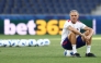 Paris Saint-Germain's Spanish coach Luis Enrique sits on a ball as he oversees a training session of his players on August 11, 2026, the eve of the UEFA Supercup football match between Champions League winners Paris Saint Germain (PSG) and Europa League winners Aston Villa in Salzburg, Austria. (Photo by FRANCK FIFE / AFP)