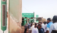 This photo taken with a mobile phone shows residents inspecting a drone-attacked mosque in Al-Droshab, north of Sudan's capital Khartoum on Aug. 12, 2026. (Photo by Mohamed Khidir/Xinhua)