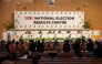 Electoral Commission of Zambia chairperson Mwangala Zaloumis (back row 3rd R) addresses the nation at the 2026 National Election Results Centre in Lusaka on August 14, 2026. Zambia resumed vote counting on August 14 after a nationwide suspension over violence raised tensions nationwide. (Photo by GIANLUIGI GUERCIA / AFP)