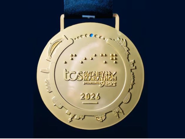 Eagle-eyed people noticed the wrong stadium depicted at the bottom right of the commemorative medal for the 2026 Sydney Marathon. (Photo: Sydney Marathon/ABCNews)