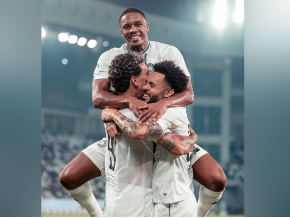 Al Sadd players celebrate during their match against Al Ahli on Saturday.