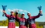 Team Qatar’s Abdulla Ali Al-Khelaifi (centre) poses with the trophy alongside his teammates.