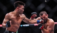Song Yadong (L) of China competes against Umar Nurmagomedov of Russia during the UFC Fight Night Bantamweight Bout (Main Event) 5 Rounds at the Oriental Sports Center in east China's Shanghai, Aug. 29, 2026. (Xinhua/Li Ming)