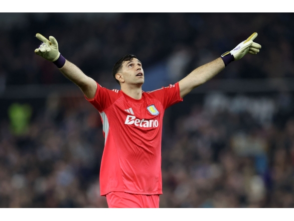 Aston Villa's Argentinian goalkeeper #23 Emiliano Martيnez celebrates his team's second goal during the UEFA Europa League, round of 16 second-leg football match between Aston Villa and Lille LOSC at Villa Park in Birmingham, central England on March 19, 2026. Photo by Darren Staples / AFP 