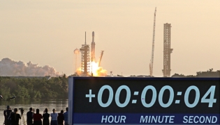 A SpaceX Falcon Heavy rocket lifts off from Launch Complex 39A with NASA's Nancy Grace Roman Space Telescope from the Kennedy Space Center at Cape Canaveral, Florida on August 30, 2026. Photo by Gregg Newton / AFP