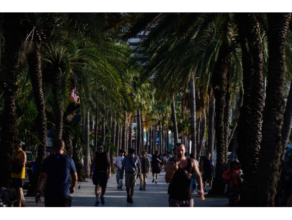Visitors walk along a promenade that runs along Pattaya Beach in Pattaya on September 1, 2026. Photo by ANTHONY WALLACE / AFP