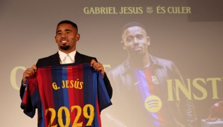Brazilian forward Gabriel Jesus poses with his jersey during his official presentation as FC Barcelona's new football player on September 1, 2026 in Barcelona. (Photo by Lluis GENE / AFP)
