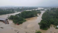 This aerial photo shows flood in Qianchuan, China's Central Jiangxi province on September 2, 2026. (Photo by CN-STR / AFP)