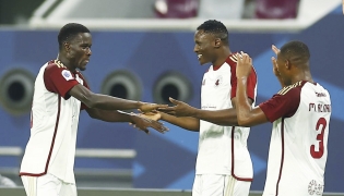 Al Arabi’s Issa Laye (left) celebrates with teammates after scoring against Al Sailiya.  