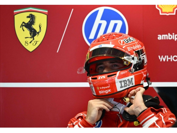 Ferrari's Monegasque driver Charles Leclerc takes off his helmet in the pits after the first practice session of the Italian Formula One Grand Prix at the Autodromo Nazionale Monza circuit in Monza, northern Italy on September 4, 2026. (Photo by Marco BERTORELLO / AFP)