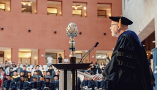 CMU-Q Dean Michael Trick addressing the students during the ceremony. 