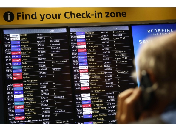 Cancelled flights are pictured on an electronic check-in display board at Terminal 3 of London Heathrow airport, west of London on September 8, 2026, following major disruption due an issue affecting the NATS air traffic control systems. Photo by Henry NICHOLLS / AFP