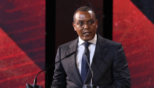 Minister of State for Economic Coordination José de Lima Massano speaking at the opening of AOG 2026.