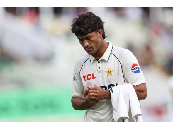 Pakistan's Razaullah leaves the field for treatment on an injury on day four of the third Test match between England and Pakistan at Edgbaston cricket ground in Birmingham on September 12, 2026. (Photo by Darren Staples / AFP) 