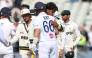 England's Joe Root (C) hugs Pakistan's Razaullah (2nd R) at the end of play on day four of the third Test match between England and Pakistan at Edgbaston cricket ground in Birmingham, central England, on September 12, 2026. (Photo by Darren Staples / AFP)