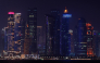 The skyline of illuminated high-rise buildings is seen along the Corniche Promenade in Doha on September 4, 2026. (Photo by Karim Jaafar / AFP)
