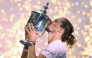 Germany's Alexander Zverev kisses the trophy after defeating USA's Ben Shelton in the men's singles final tennis match on day fifteen of the US Open tennis tournament at the USTA Billie Jean King National Tennis Center in New York on September 13, 2026. (Photo by ANGELA WEISS / AFP)