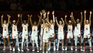 US' power forward #10 Breanna Stewart lifts the trophy after winning with her team the 2026 FIBA Women Basketball World Cup final game against France in Berlin on September 13, 2026. (Photo by Odd ANDERSEN / AFP)