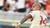 Roma's Dutch forward #14 Donyell Malen celebrates scoring Roma's first goal during the Italian Serie A football match between Torino FC and Roma at the Olympic Stadium Grande Torino in Turin, northern Italy on September 14, 2026. (Photo by Isabella BONOTTO / AFP)