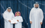 Minister of Environment and Climate Change H E Dr Abdullah bin Abdulaziz bin Turki Al Subaie presents an award to one of the winners during the event.