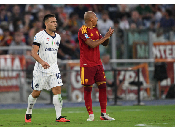 Inter Milan's Argentinian forward #10 Lautaro Martinez celebrates after scoring during the Italian Serie A football match between AS Roma and Inter Milan at The Olympic Stadium in Rome on September 19, 2026. (Photo by Andreas SOLARO / AFP)