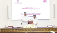 CEO of QMC, H E Sheikh Khalid bin Abdulaziz Al-Thani (left) and President of QU, Dr. Omar Al-Ansari at the agreement signing ceremony. 
