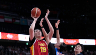 Zhang Ziyu (L) of China goes to the basket during the women's bronze medal match between China and Chinese Taipei at the 20th Asian Games Aichi-Nagoya 2026 in Nagoya, Japan, Sept. 26, 2026. (Xinhua/Tao Xiyi)
 