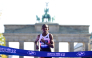 Ethiopia's Tigst Assefa crosses the finish line to win the women's race of 52nd Berlin Marathon in Berlin, Germany on September 27, 2026. (Photo by John MacDougall / AFP)
 