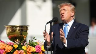 President Donald Trump speaks to the crowd on the first tee during Sunday's Singles on day four of the Presidents Cup 2026 at Medinah Country Club on September 27, 2026 in Medinah, Illinois. (Photo by Sarah Stier / GETTY IMAGES NORTH AMERICA / Getty Images via AFP)