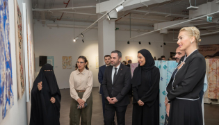 Officials and visitors during the exhibition.