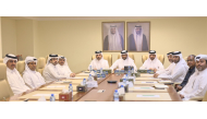 Vice-Chairman of Central Municipal Council H E Mubarak Feraish Al-Salem with CMC members and other officials during a meeting.