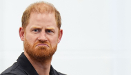 Britain's Prince Harry, Duke of Sussex reacts during a panel discussion during his visit to Ninestiles School, in Birmingham, central England on September 18, 2026, as part of the launch of the INSPIRE education programme ahead of the Invictus Games in Birmingham in 2027. Photo by Aaron Chown / POOL / AFP