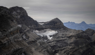 This photograph taken in western Switzerland on September 24, 2026 shows the remains of the now tiny Mauvais glacier, above Les Diablerets. The Swiss Glacier Monitoring Network (GLAMOS) will release its annual report on the state of Swiss glaciers on October 1, 2026. (Photo by Fabrice COFFRINI / AFP)
