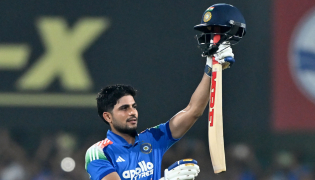ndia's captain Shubman Gill celebrates after scoring a double-century (200 runs) during the second one-day international (ODI) Cricket match between India and West Indies at the Barsapara Cricket Stadium in Guwahati on September 30, 2026. (Photo by BIJU BORO / AFP)