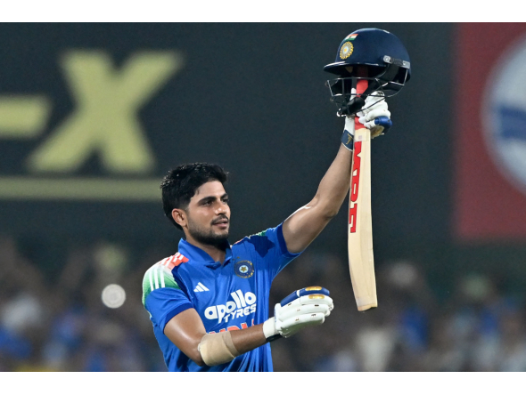 ndia's captain Shubman Gill celebrates after scoring a double-century (200 runs) during the second one-day international (ODI) Cricket match between India and West Indies at the Barsapara Cricket Stadium in Guwahati on September 30, 2026. (Photo by BIJU BORO / AFP)