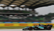 Mercedes' Italian driver Kimi Antonelli steers his car during the third practice session ahead of the Formula One Bahrain Grand Prix in Sepang on October 3, 2026. (Photo by Jade Gao / AFP)