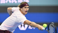 Germany Alexander Zverev hits a return to China Shang Juncheng during their men singles match at the China Open tennis tournament in Beijing on October 3, 2026. (Photo by GREG BAKER / AFP)
