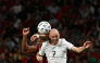 Portugal's defender #13 Renato Veiga and Norway's midfielder #07 Fredrik Aursnes vie for a header during the UEFA Nations League Group 4 football match between Portugal and Norway at Dragao stadium in Porto on October 3, 2026 (Photo by Miguel RIOPA / AFP)