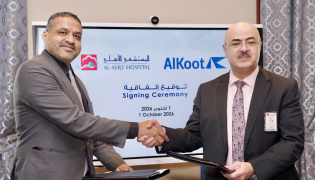 Al-Ahli Hospital and Al Koot Insurance & Reinsurance Company officials during the agreement signing event.  