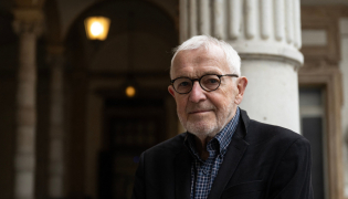 Nobel Prize in Physics laureate and Belgian-American particle physicist Francis Halzen poses at the Rectorate of the University of Turin, in Turin, Italy, on October 7, 2026. Photo by Marco Bertorello / AFP