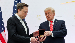 Tesla and SpaceX CEO Elon Musk (L) receives the National Medal of Science from U.S. President Donald Trump during the Golden Age of American Innovation Summit at the Institute of Peace on October 08, 2026 in Washington, DC. Photo by WIN MCNAMEE / GETTY IMAGES NORTH AMERICA / Getty Images via AFP