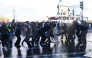 French police officers clash with protesters during a demonstration of high-school students at Place de la Bastille, in Paris, on October 8, 2026, as part of a nationwide protest movement over learning conditions. Photo by Kenzo TRIBOUILLARD / AFP