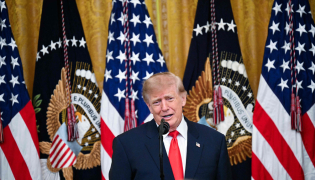 US President Donald Trump speaks during a Columbus Day celebration in the East Room of the White House in Washington, DC, on October 9, 2026. (Photo by Alex WROBLEWSKI / AFP)
