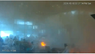 This screen grab taken from CCTV footage released by the Saudi Media Ministry on October 11, 2026, shows the moment Riyadh International was hit by a Houthi strike on October 10, 2026. (Photo by Saudi Media Ministry / AFP) 