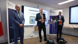 (From L) Divisional commissioner of police and head of the Interdepartmental Judicial Police Service (SIPJ) for the Alpes-Maritimes department Eric Antonetti, Marseille public prosecutor Nicolas Bessone and National Director of France's Judicial Police Christian Sainte attend a press conference on October 12, 2026, following the recovery on October 9 of two paintings by French impressionist painter Pierre-Auguste Renoir. (Photo by Thomas Samson / AFP)