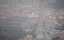 A general view of Chinatown in Singapore on October 16, 2026, as the country continues to be shrouded in haze caused by fires in Indonesia. (Photo by Yuichi Yamazaki / AFP)