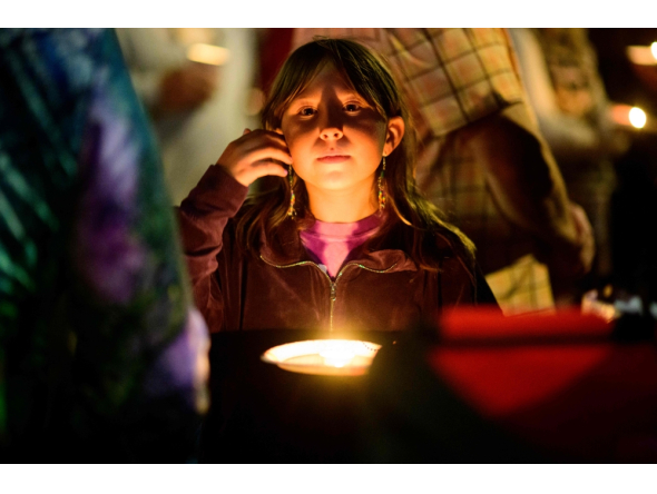 Community members grieve during a candlelight vigil at Peace Corner on October 16, 2026 in Bend, Oregon. Mathieu Lewis-Rolland/Getty Images/AFP
