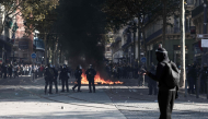 French Republican Security Corps hold protective shield prior to the start of a demonstration to protest against the 'high cost of living', in Marseille on October 17, 2026. (Photo by Thibaud Moritz / AFP)