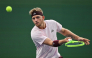 Spain's Alejandro Davidovich Fokina hits a return to Germany's Alexander Zverev during their men's singles semi-final match at the Shanghai Masters tennis tournament in Shanghai on October 17, 2026. (Photo by Hector Retamal / AFP)